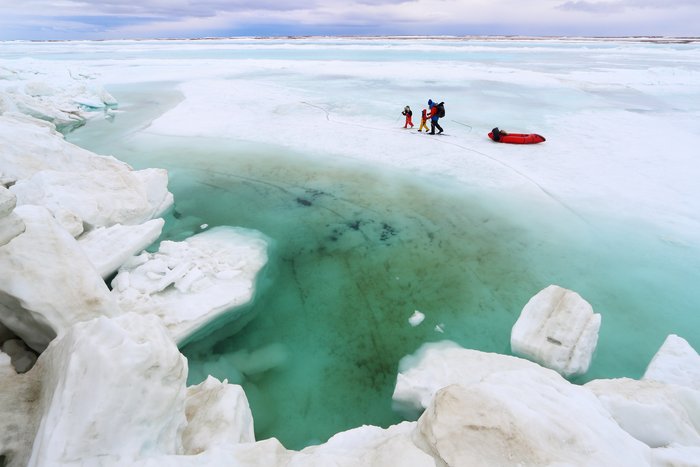 Spring skiing on sea ice involved dodging pools and piles