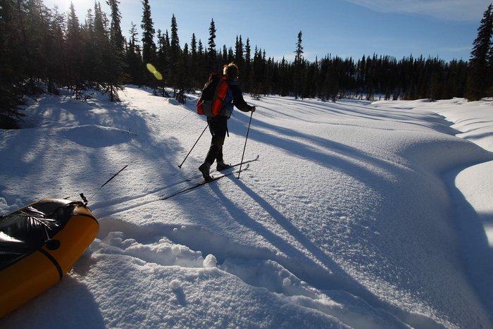 The packraft sleds pulled smoothly across the frozen ponds and marshes