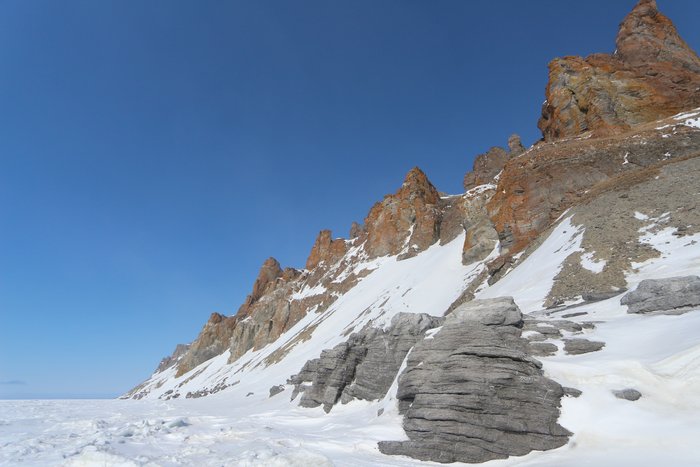 Between Lost River and Wales on the Seward Peninsula is a series of high headlands like this one.  Valleys channelize intense winds that blast out over the ice, and groundwater springs weaken the ice.