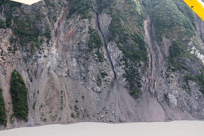 This steep unstable slope above Grewingk Lake was supported by 100s of meters of ice not long ago - the ice face retreated past here in the early 2000s. With the support gone, there's a risk of landslides which could create large tsunamis.