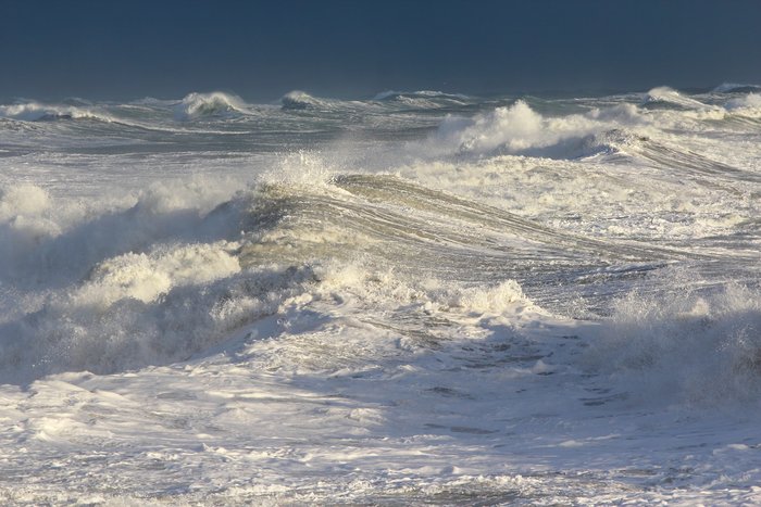 The waves peaked a day after the storm peaked, providing pleasant weather for viewing.