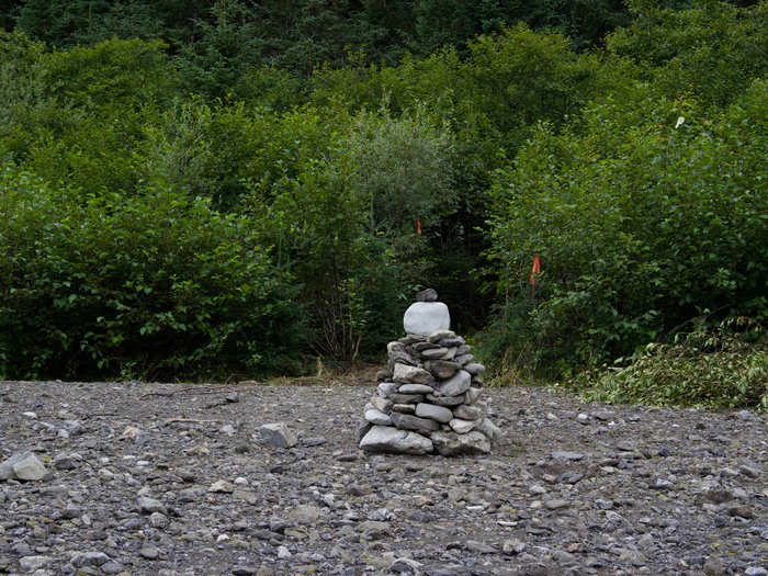 Prominent cairns on either side of the river mark the Tutka Backdoor trail.