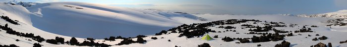 A tent in a lava field on the Alaska Peninsula