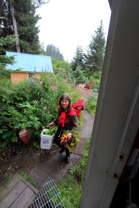 Hig has been running the old clunker sewing machine through a number of rubber bands (our replacement for sewing machine belts), making the most crucial gear for our Malaspina expedition.