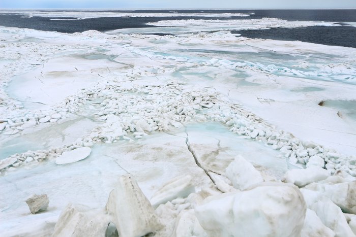 Broken rumpled ice at the edge of the shorefast ice, well into spring