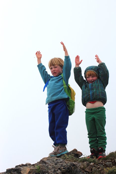 After prodding from parents and grandma, the kids posed on the peak.  But they're not that interested in the goal - the journey is much more interesting.