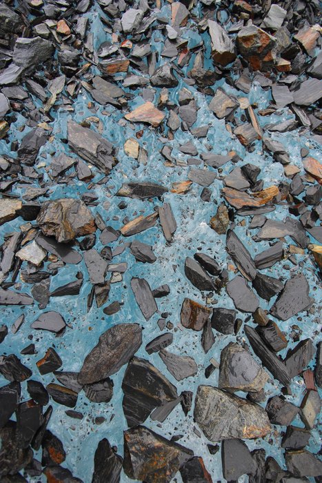 The "rock hills" that make stripes across the expanse of Malaspina Glacier are really only one rock thick.