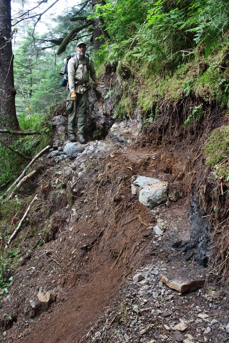 Eric Clark checks out a particularly difficult bit of trail.