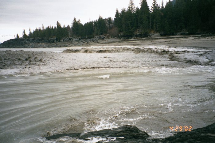 Photo 5 - Reflected bore moving back out against onrushing water.