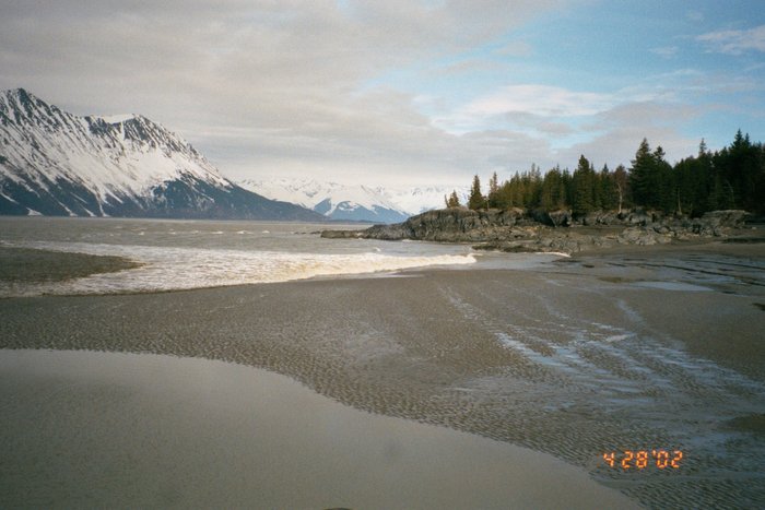 Photo 3 - the bore begins climbing the beach.