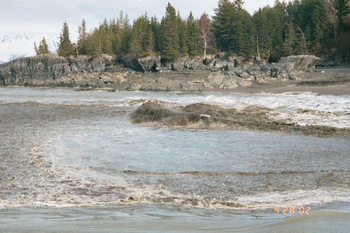 Photo 6 - the reflected bore is advancing slowly and violently against the inrushing current.  Note how sediment-rich the water is at this point.