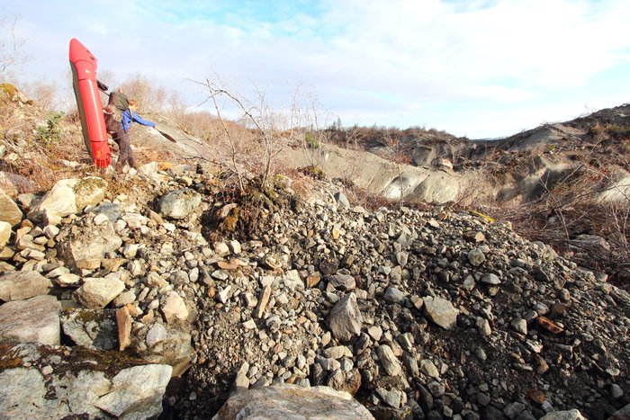 In the end this portage involved a lot of boulders, some bushwhacking, and a butt-slide into a muddy crevasse filled with the overturned remains of a forest.