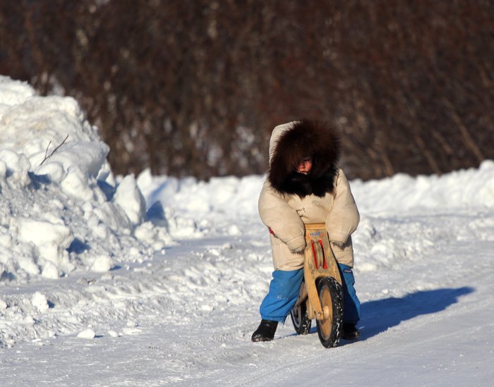 Katmai tries out his balance bike in single digit temperatures.